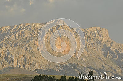 Taurus Mountains on the background of sky. Vertices covered with snow. Tourism Stock Photo