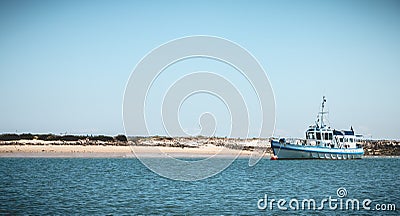 View of the lagoons of the Ria Formosa Natural Park near the Port of Tavira, portugal Editorial Stock Photo