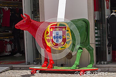Cow sculpture of Portuguese flag Editorial Stock Photo