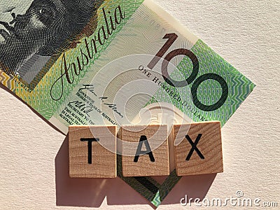 Tax and Australian hundred dollar bill Stock Photo