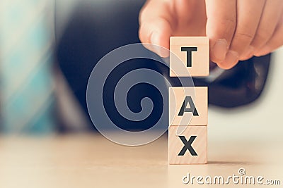 TAX concept, on wooden block. Including of state taxes,tax payment, governant ,calculating finance, Stock Photo