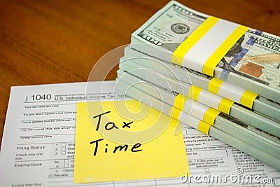TAX DEDUCTIONS and individual tax return Editorial Stock Photo