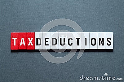 Tax deductions - word concept on building blocks, text Stock Photo