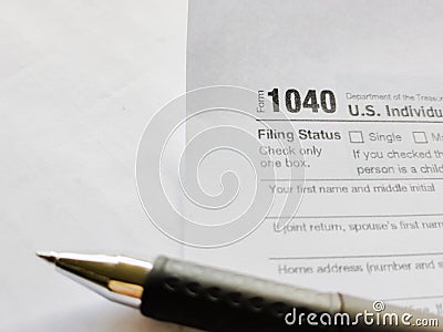 Tax-filling concept - image of 1040 tax form background. Stock photo. Editorial Stock Photo