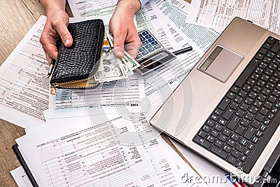tax form, money, business chart, laptop Stock Photo