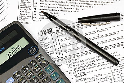 Tax forms, calculator and pen Editorial Stock Photo