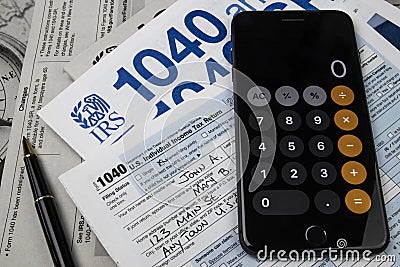 1040 Tax forms from the IRS. Form 1040 is used by U.S. taxpayers to file an annual income tax return. Editorial Stock Photo