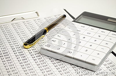 Tax forms, spread sheet with pen and calculator Stock Photo
