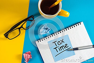 Tax Time Concept On office manager desk. Notification of the need to file tax returns, tax form Stock Photo