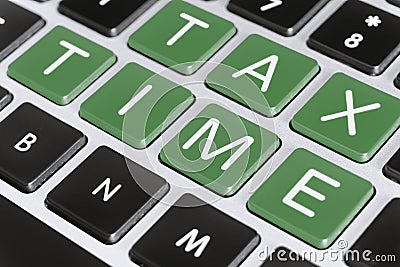 Tax Time Word on Computer Keyboard Stock Photo