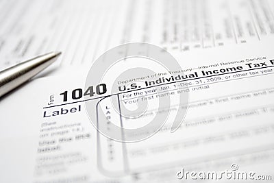 Taxes forms and pen Editorial Stock Photo