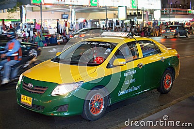 A taxi Bangkok speeding through the city Editorial Stock Photo