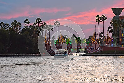 Taxi boat arriving at bridge on colorful palm trees and magenta sky background in Lake Buena V Editorial Stock Photo