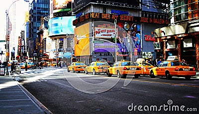 Taxi cabs on Times Square in NYC Editorial Stock Photo