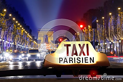 Taxi at the champs elysees Stock Photo