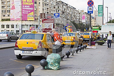 Taxi parking space on Unirii Square Editorial Stock Photo