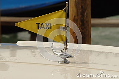 Taxi sign on boat. Venice Stock Photo