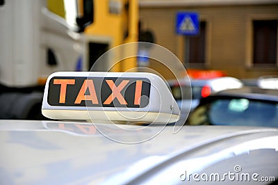 Taxi sign in Italy Stock Photo