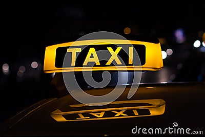 Taxi sign at night , taxi cars Stock Photo