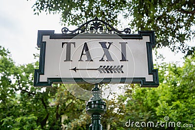 Taxi sign on the street in Europe - antique, european style Stock Photo