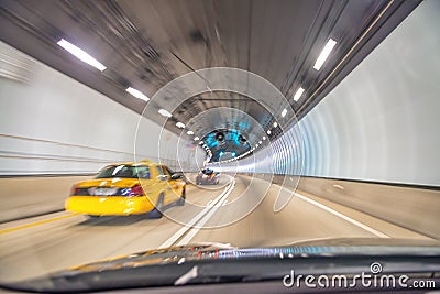 Taxi speeding up along Miami tunnel, blurred fast motion Editorial Stock Photo