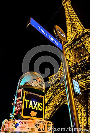 Taxi stop by the Eiffel Tower, Paris, France Editorial Stock Photo