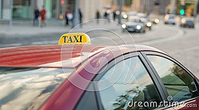 Taxi parked on the sidewalk of a large street with large traffic jams, the car reflects the lights of the evening city Stock Photo