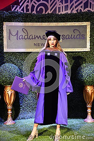 Taylor Swift NYU Graduation statue at Madame Tussauds in Times Square in Manhattan, New York City Editorial Stock Photo