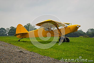 Taylorcraft L-2. American reconnaissance aircraft in World War II. Painted yellow for exhibition Editorial Stock Photo