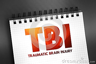 TBI Traumatic Brain Injury - intracranial injury to the brain caused by an external force, acronym text concept on notepad Stock Photo