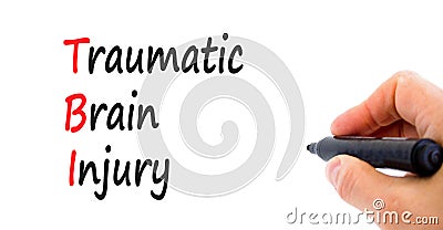 TBI traumatic brain injury symbol. Concept words TBI traumatic brain injury on paper on a beautiful white background. Doctor hand Stock Photo