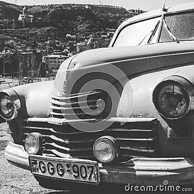 An old Soviet car on the streets of Tbilisi - GEORGIA - Capital City Beauty Editorial Stock Photo