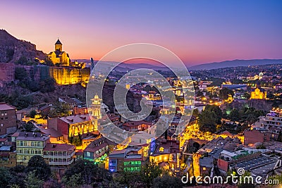 Tbilisi colorful skyline at sunset, Country of Georgia Stock Photo