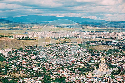 Tbilisi Georgia. Aerial View Of Sameba Complex, Holy Trinity Cathedral Surrounded By Populous Private Residential Area. Stock Photo