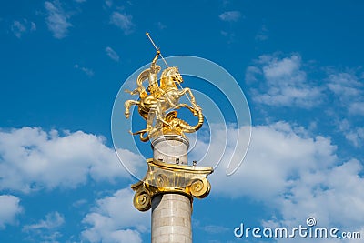Tbilisi, Georgia - 30.08.2018: Golden statue of St. George on th Editorial Stock Photo