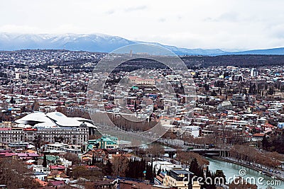 TBILISI, GEORGIA - January 08, 2023: Beautiful top view landscape of Tbilisi Georgia. Sight-seeing the city scape and the Kura Editorial Stock Photo