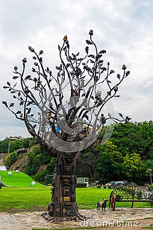 Tbilisi, Georgia - June 20, 2018: Landmark in Rikhe park, city center of Tbilisi, statue of iron tree Editorial Stock Photo