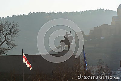 Tbilisi, winter. Monument To Vakhtang Gorgasali. In the background, Tabor Monastery of the Transfiguration. Stock Photo