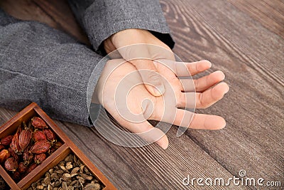 TCM doctors show how to massage hands Stock Photo