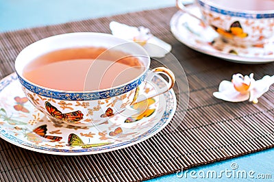 Tea on bamboo Stock Photo
