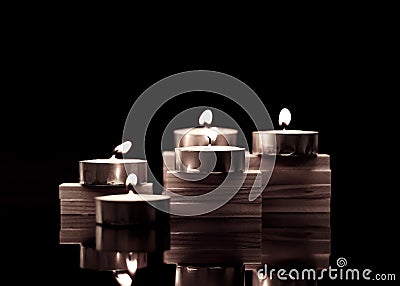 Tea Candles on Wood Blocks Stock Photo