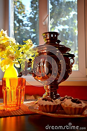 Tea ceremony in Russian with a samovar Stock Photo