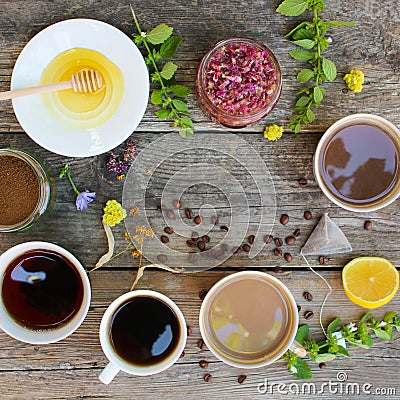 Tea, coffee, cocoa in cups, chicory, lemon, mint, jam made of rose petals, dried lime, honey Stock Photo