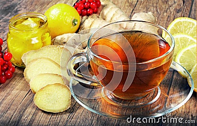 Tea for cold and flu. Lemon, ginger, kiwi fruit, and viburnum for tea for a cold. Stock Photo