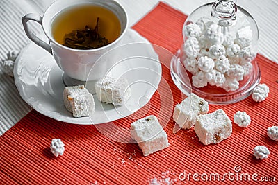 Tea cookies on wooden background. Homemade pastry concept. Composition of tiny gateau with sugar powder for tea time. Star shaped Stock Photo
