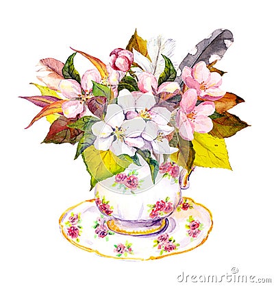 Tea cup with autumn leaves, cherry flowers and vintage feathers. Stock Photo