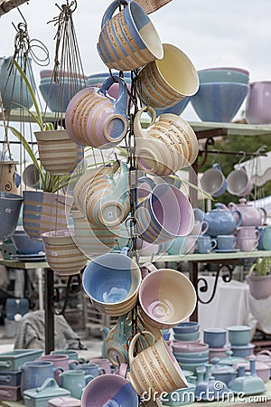 Tea cups. Tough and practical, utilitarian ware for the kitchen. Art ware, tableware, decorative ware. Fair of pottery on the city Stock Photo