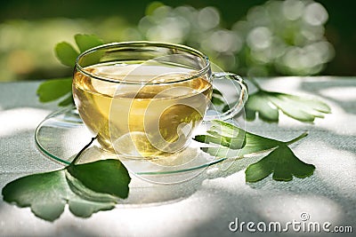 Tea with herbaceous plant Stock Photo