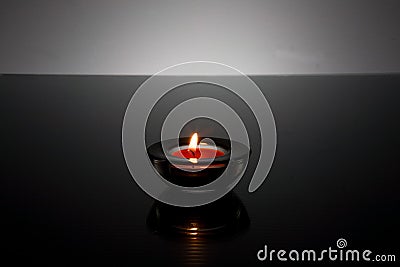 Tea light Candle in glass holder Stock Photo