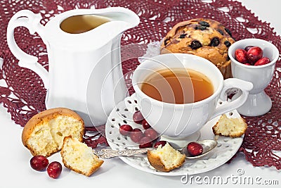 Tea, muffins and fresh cranberries Stock Photo